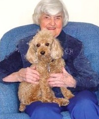 Anna C. Briggs, founder of The National Humane Education Society, with her dog